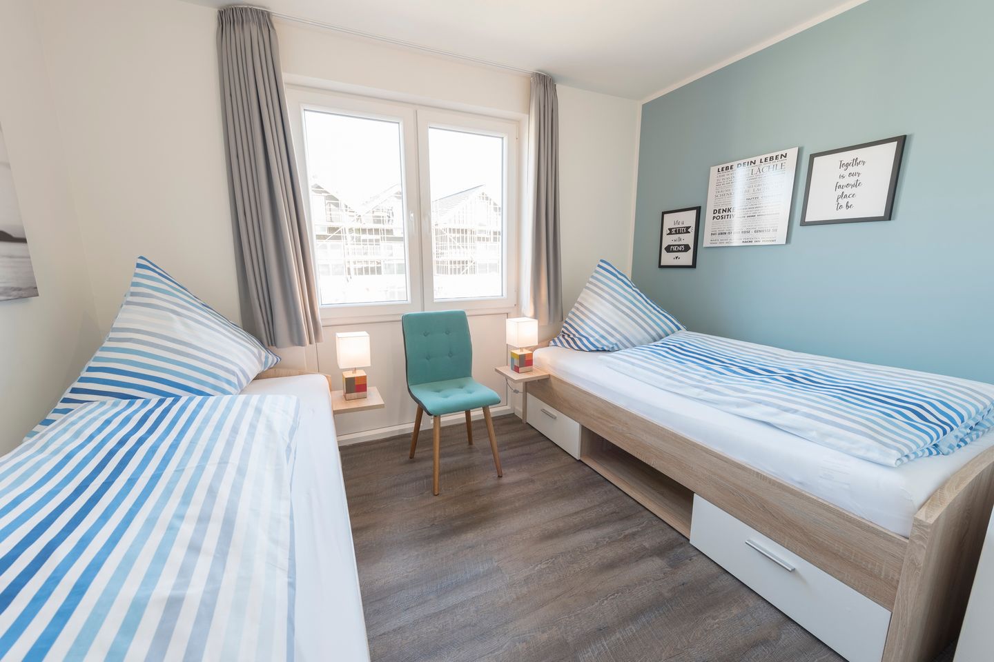 NordseeResort Friesland Ferienhäuser NordseeResort Friesland 38 Schillig - Schlafzimmer mit zwei Einzelbetten