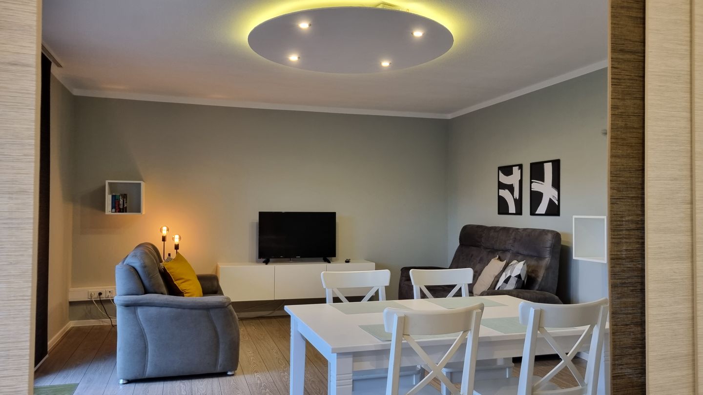 Haus Spökenkieker Loppersum Kiebitzdelle Dünen - Wohnzimmer Sitzecke und Essecke