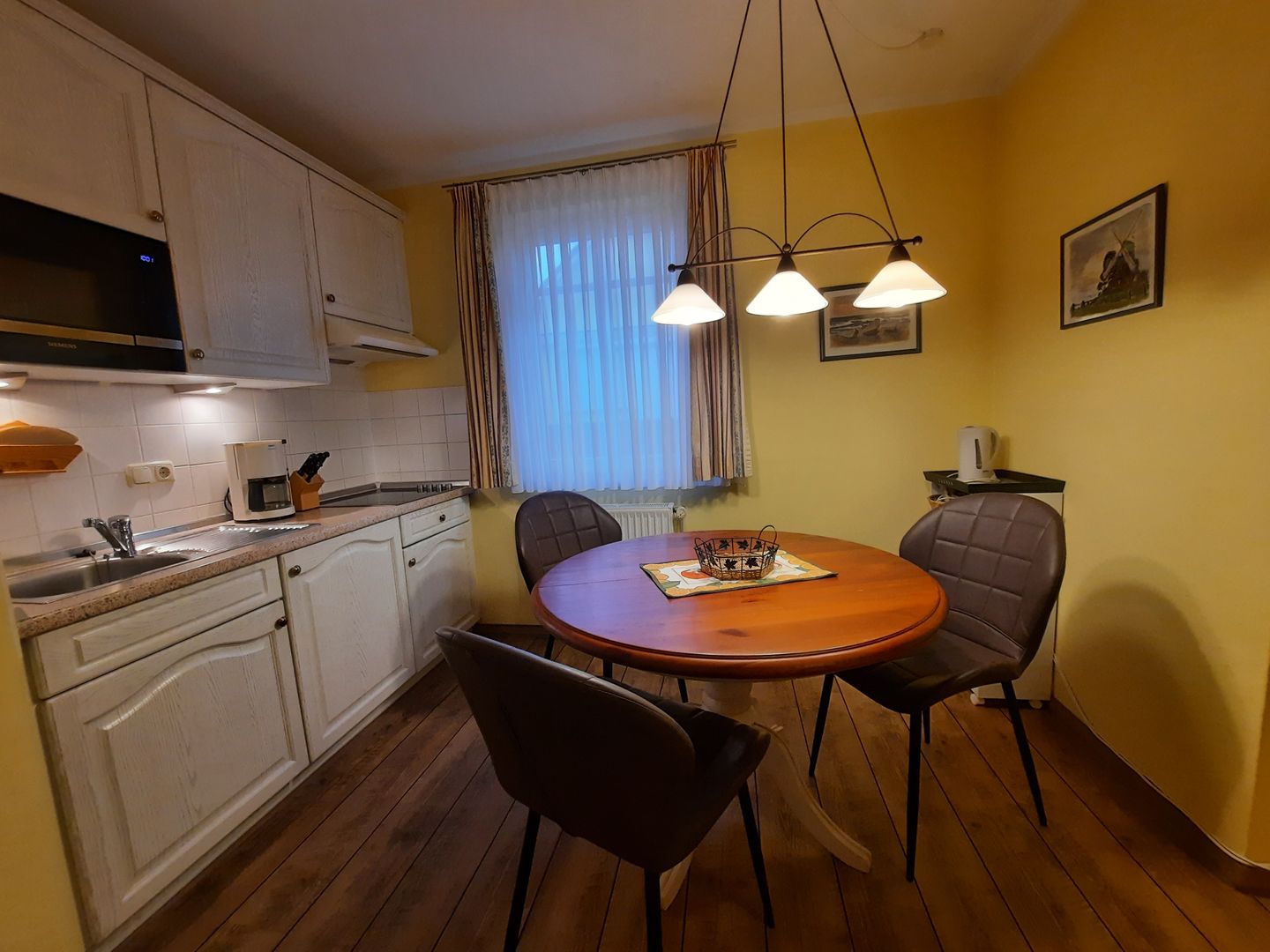 Schaumburg Schaumburg 07 Kühlungsborn - Wohn-Essbereich mit Couch