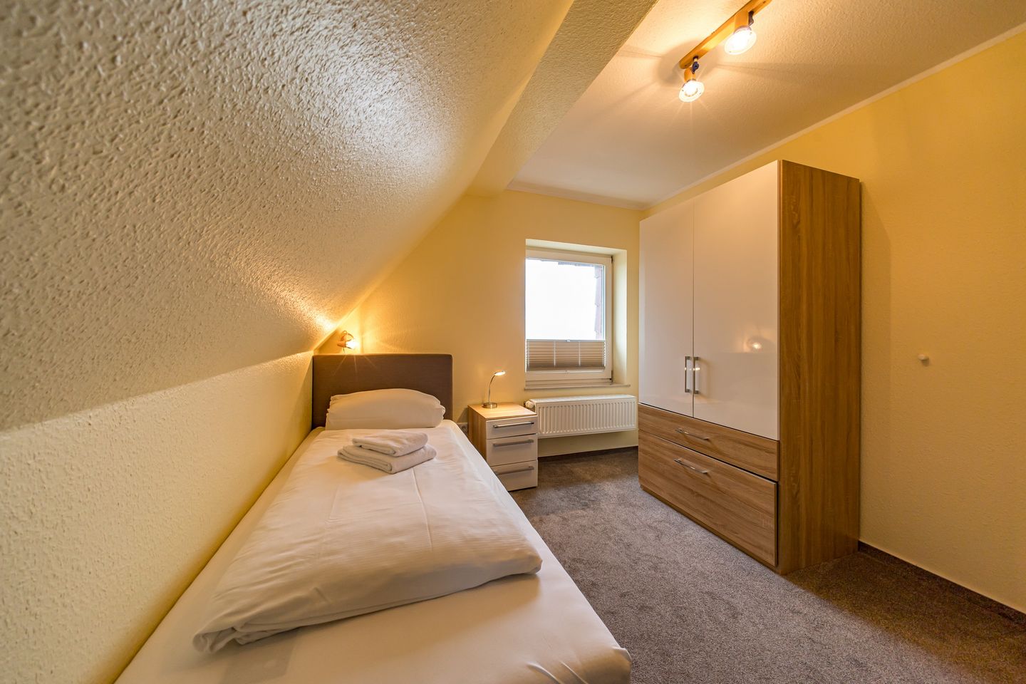 Hus Strandkieker Hus Strandkieker 04 Schillig - Schlafzimmer mit zwei Einzelbetten