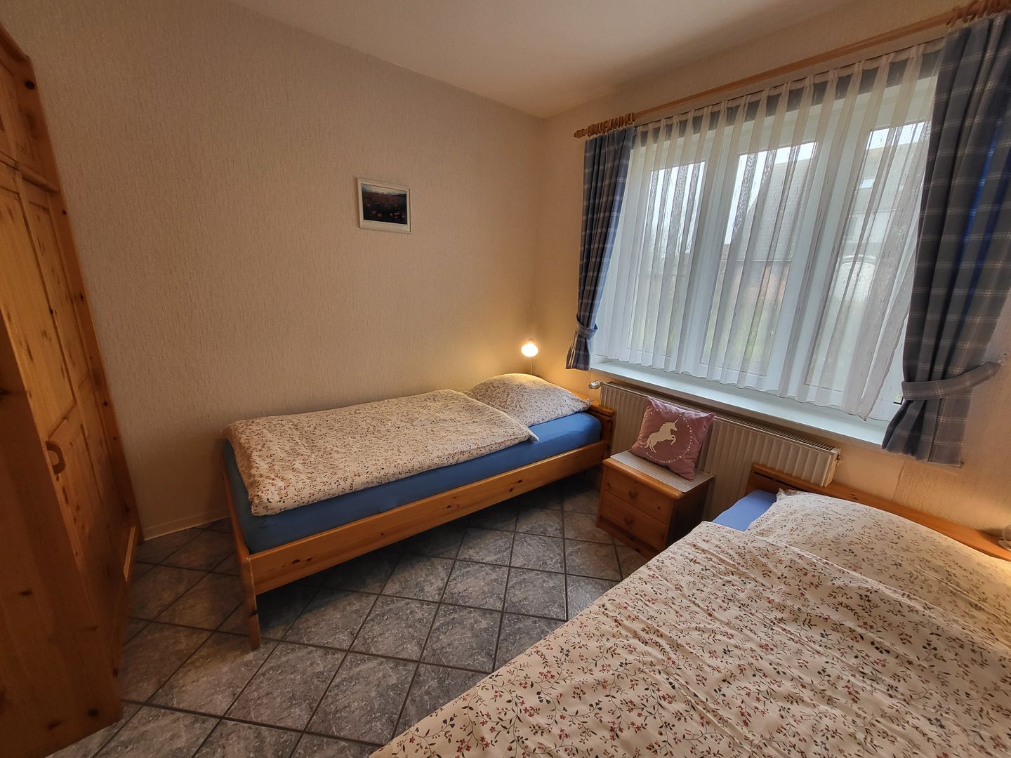 Haus Friesenglück Whg. Seepferdchen Alkersum - Schlafzimmer