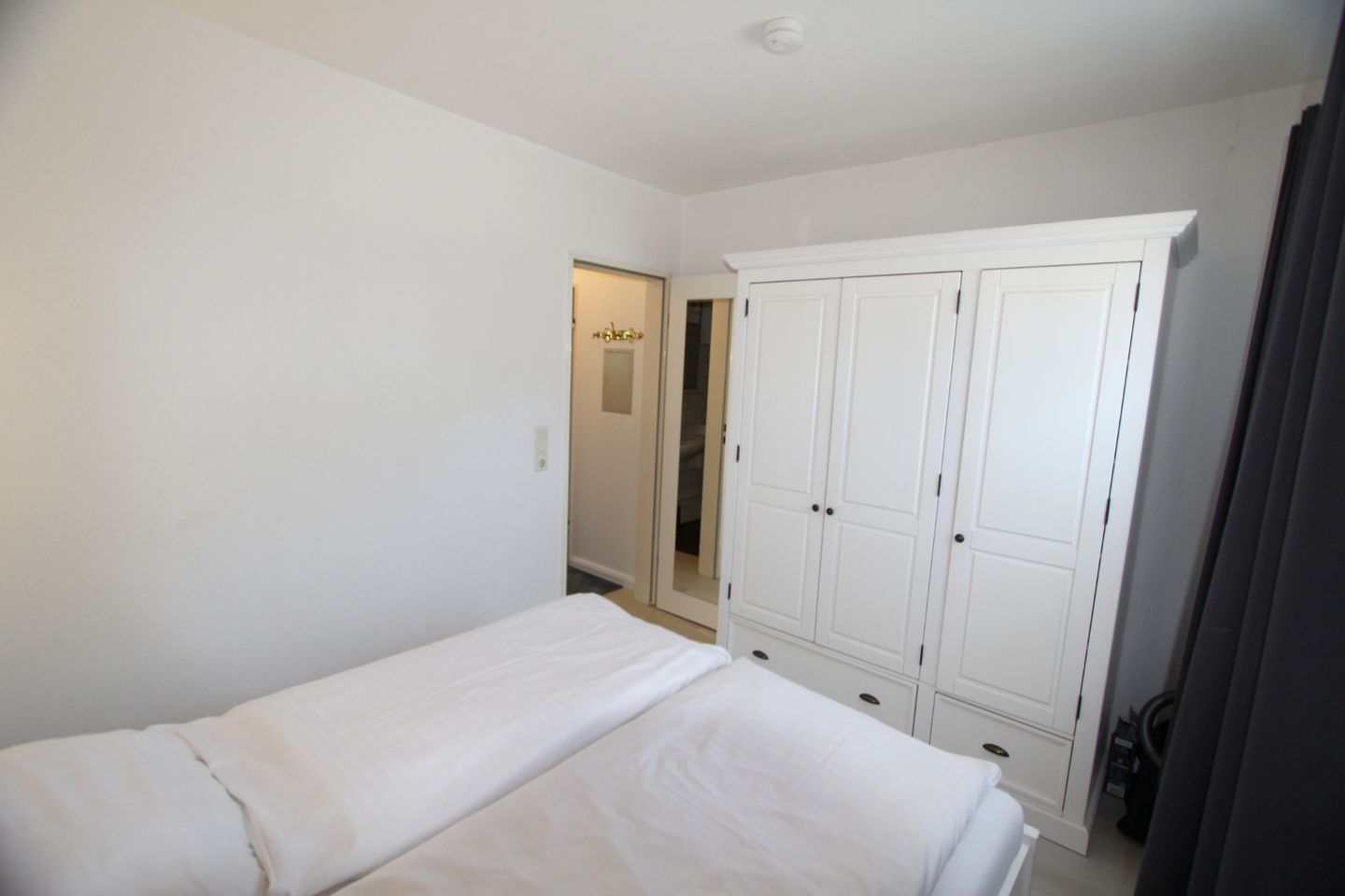 Abendwind - Ostmarkstr. 2, App. 2 Wenningstedt - Schlafzimmer