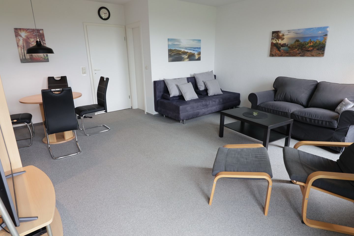 Sünnslag Sünnslag 37 Boltenhagen - Wohn-Essbereich mit Couch und Sitzgelegenheit