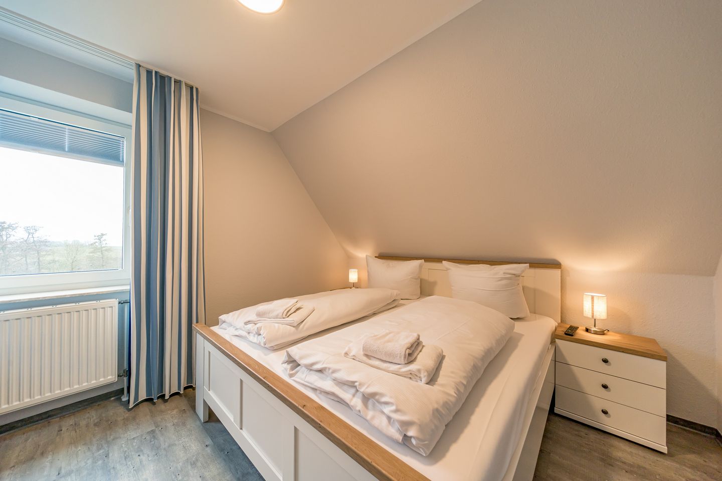 Hus Inselkieker Hus Inselkieker 218  Schillig - Schlafzimmer mit Doppelbett