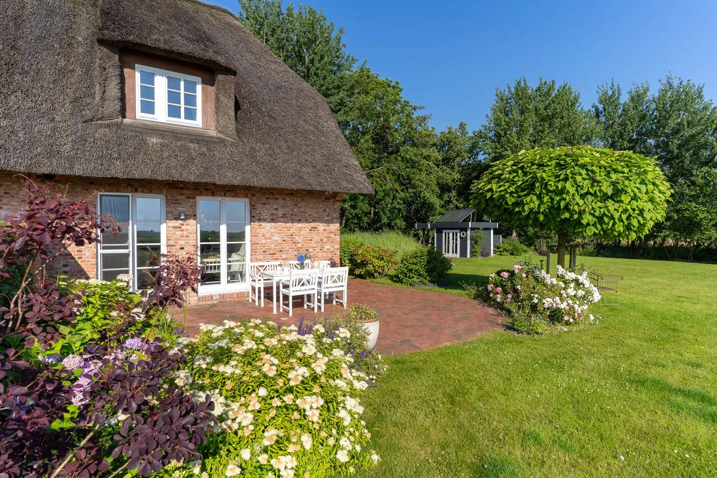 Reetdachhaus Lütt Strandhüs Reetdachhaus Lütt Strandhüs SPO Boehl - 