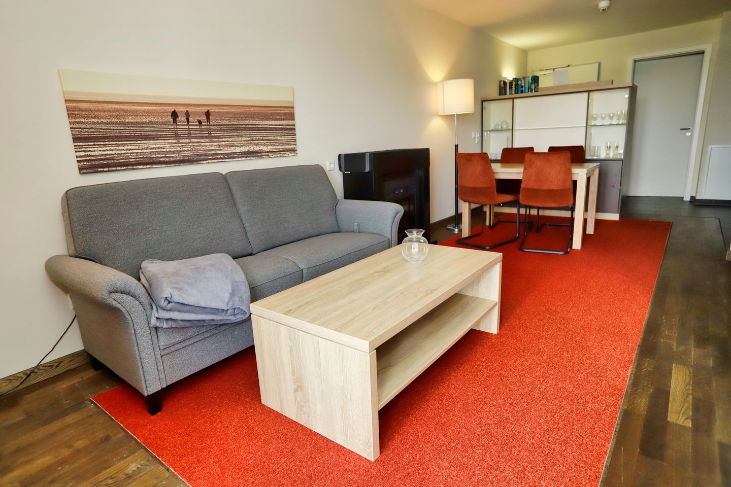 Resort Deichgraf Resort Deichgraf 31-12 Wremen - Wohn-Essbereich mit Couch