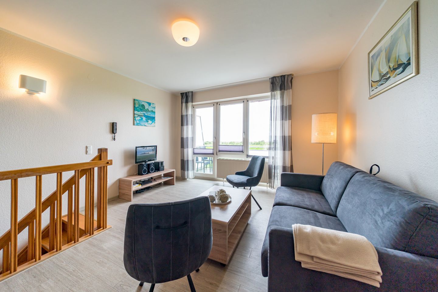 Hus Strandkieker Hus Strandkieker 01 Schillig - Wohn-Essbereich mit Couch