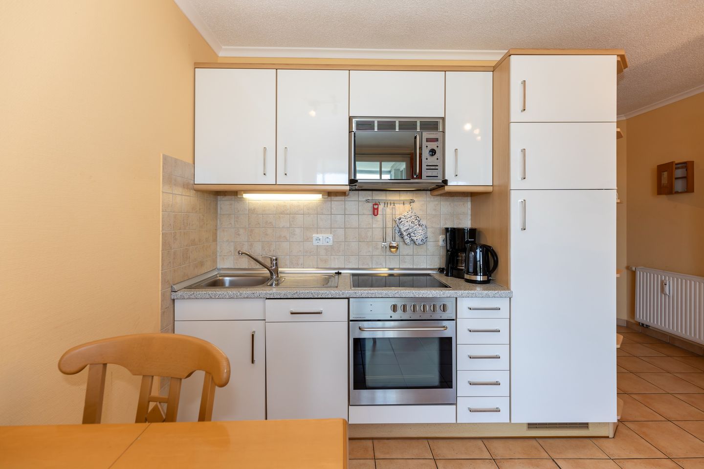 Apartmenthaus Atlantik Apartmenthaus Atlantik 318 Kühlungsborn - Wohn-Essbereich mit Küchenzeile