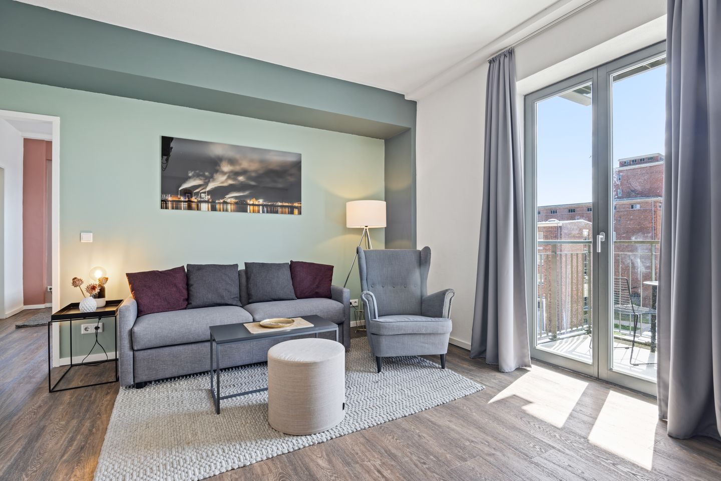 Ohlerich Speicher Ohlerich Speicher 4-22 Wismar - Wohn-Essbereich mit Couch