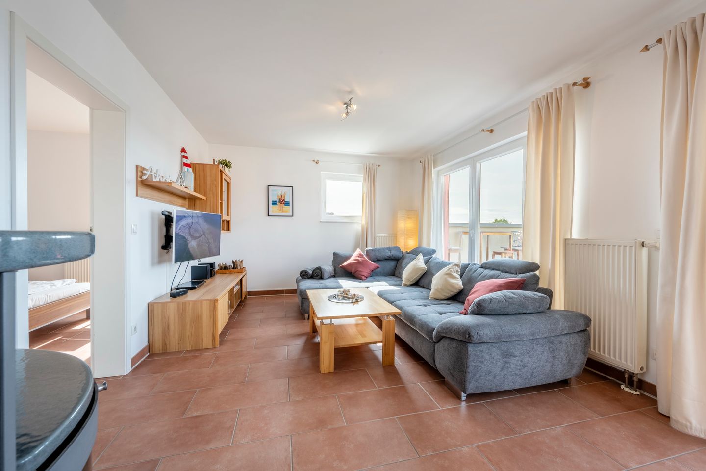 NordseeResort Friesland NordseeResort Friesland 52-4-S Schillig - Wohn-Essbereich mit Couch