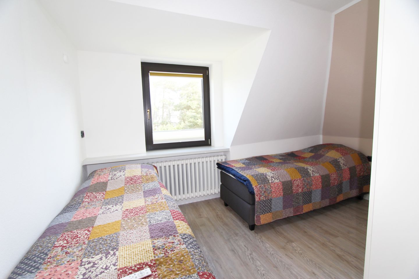 Im Grund 9 - App. 3 Wenningstedt - Schlafzimmer