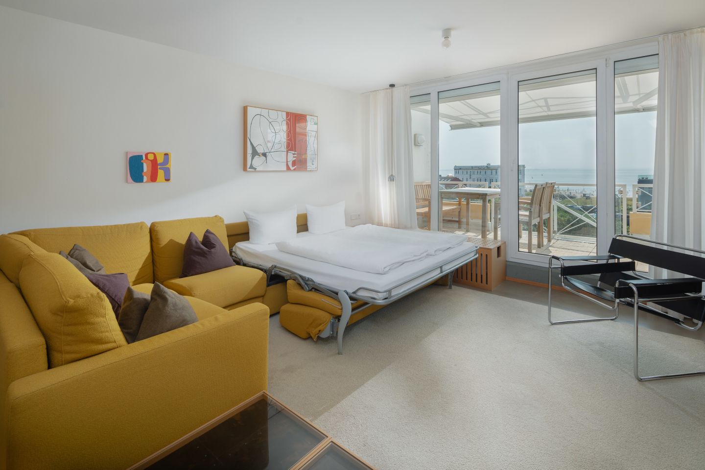  Poseidon am Weststrand Norderney - die insellotsen Norderney / Poseidon am Weststrand - Wohnzimmer mit Schlafsofa