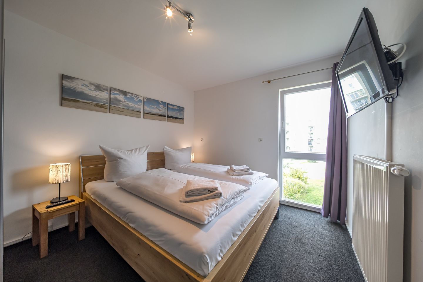 NordseeResort Friesland NordseeResort Friesland 51-2-N Schillig - Schlafzimmer mit Doppelbett