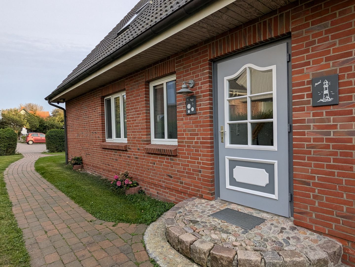 Haus Friesenglück Whg. Muschel Alkersum - Fassade / Eingang