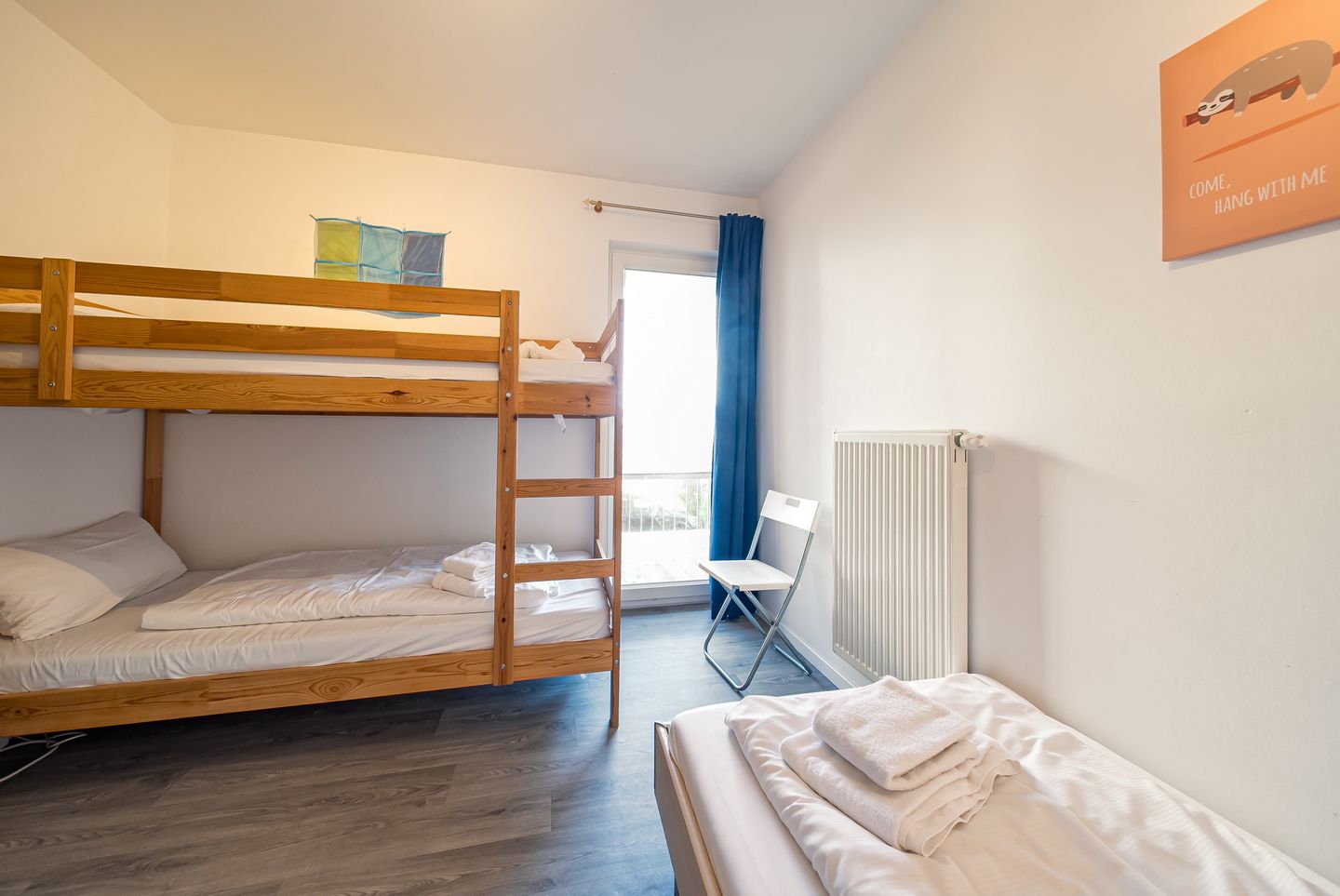 NordseeResort Friesland NordseeResort Friesland 51-1-M Schillig - Schlafzimmer mit Etagenbett und Einzelbett