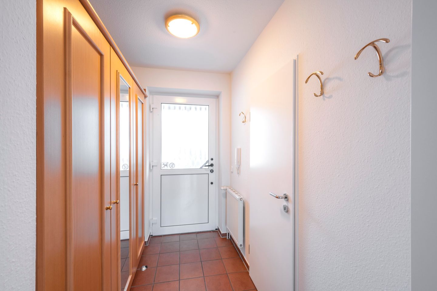 Hus Inselkieker Hus Inselkieker 107 Schillig - Flur mit Garderobe