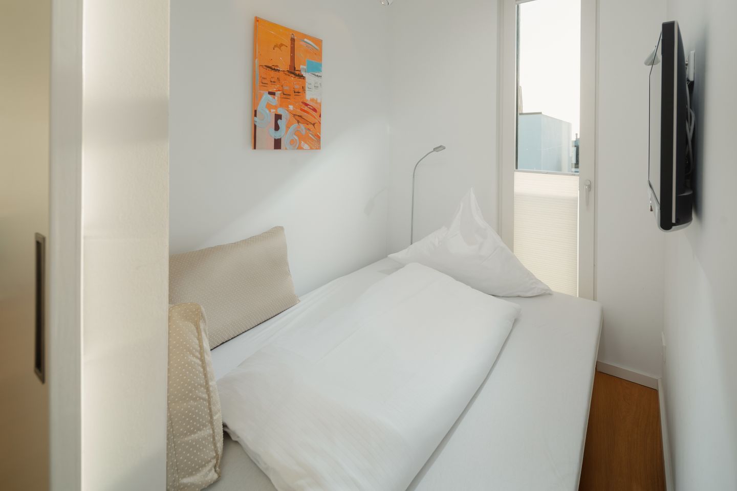  Meerblick-Penthouse "Sonnenseite" in der Villa van Halem Norderney - die insellotsen Norderney / Sonnenseite - Lesezimmer mit Schlafsofa