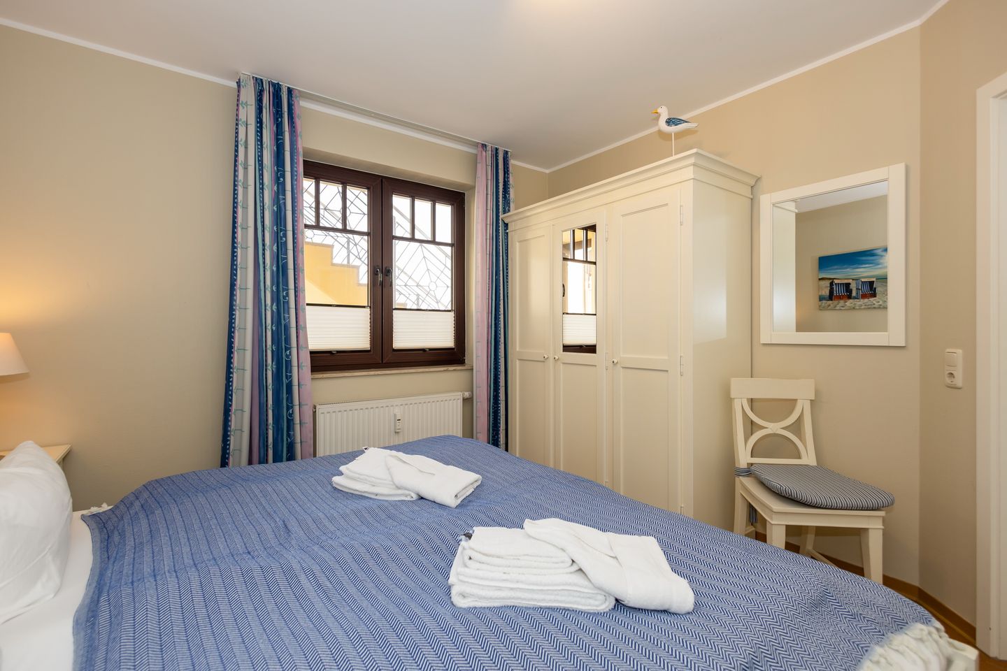 Urlaubsräume am Meer Urlaubsräume am Meer 1-11 Kühlungsborn - Schlafzimmer mit Doppelbett