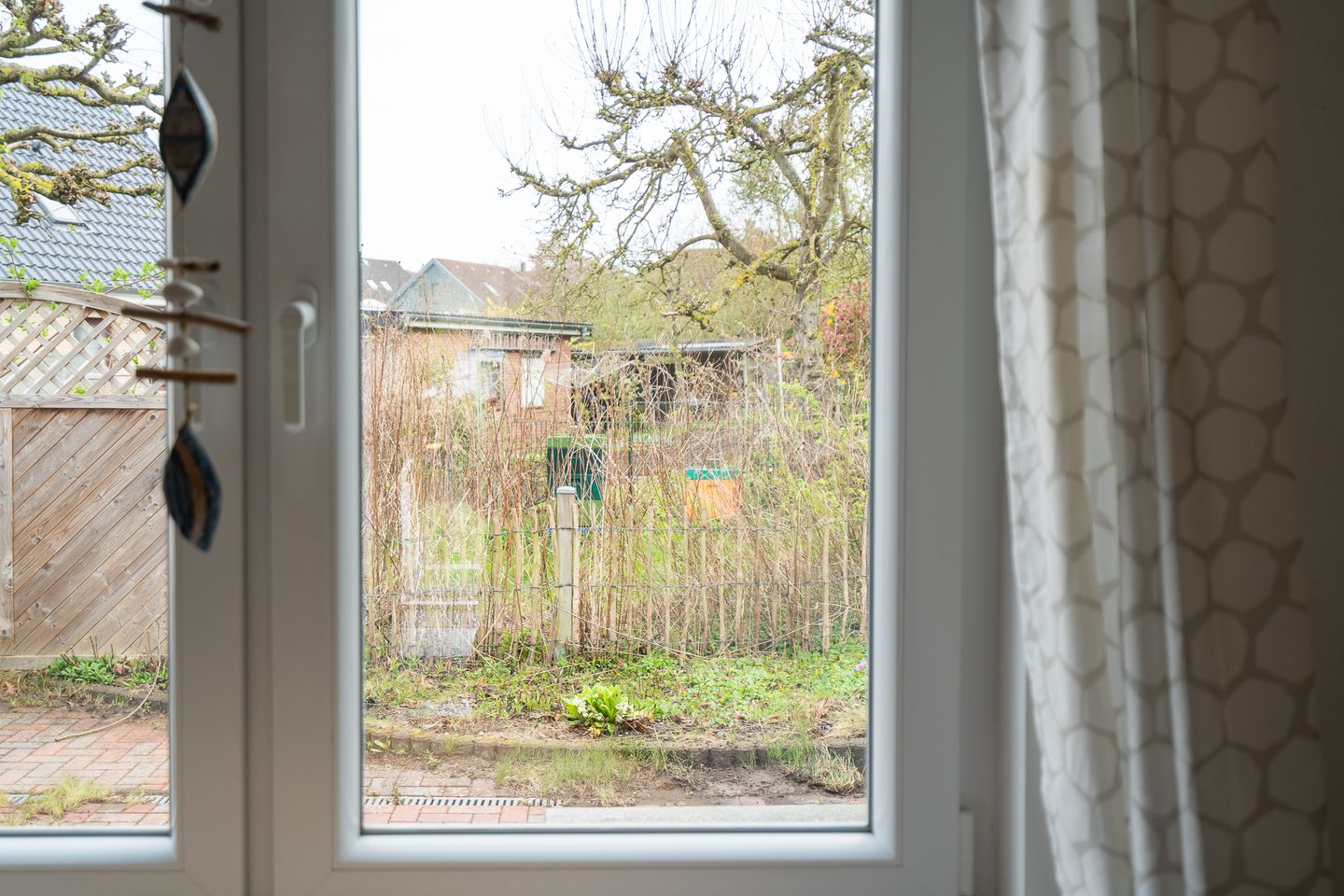  Lütthus Pelzerhaken - Gartenblick