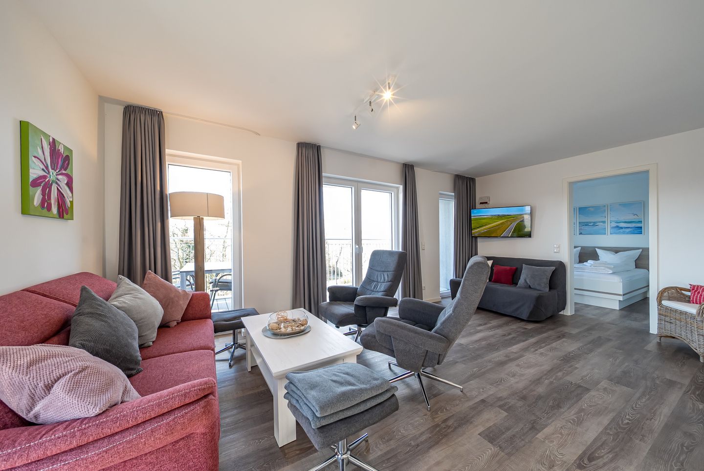 NordseeResort Friesland Nordseeresort Friesland 50-3-s Schillig - Wohn-Essbereich mit Couch