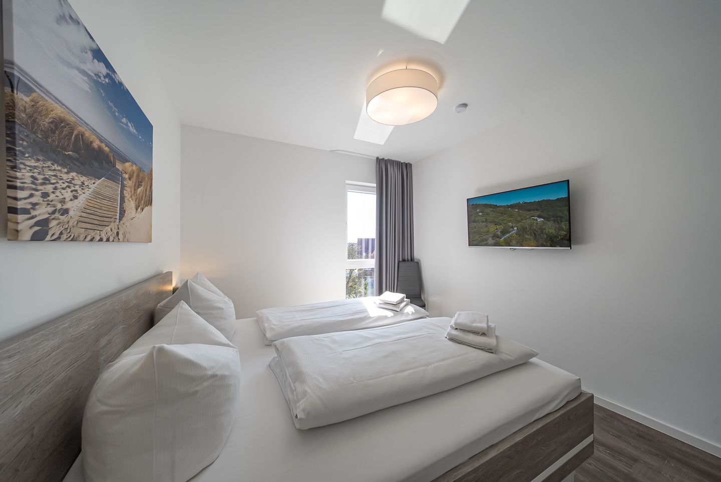 NordseeResort Friesland Nordseeresort Friesland 50-3-s Schillig - Schlafzimmer mit Doppelbett