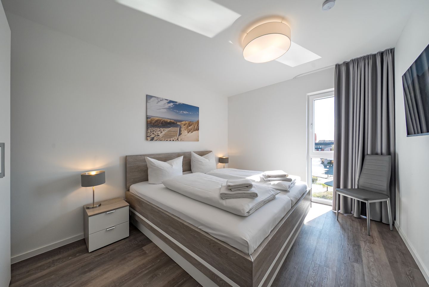 NordseeResort Friesland Nordseeresort Friesland 50-3-s Schillig - Schlafzimmer mit Doppelbett