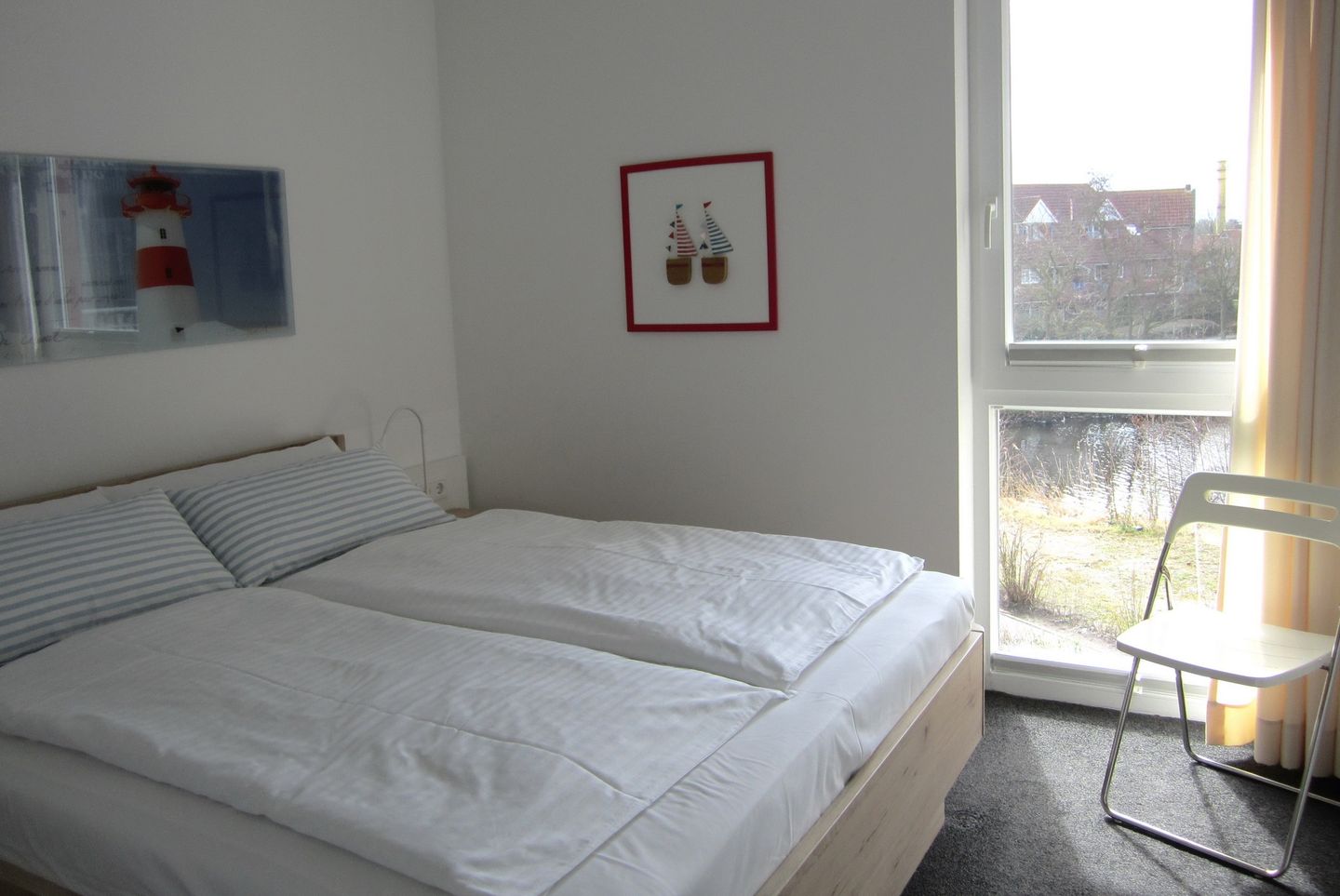 NordseeResort Friesland NordseeResort Friesland 51-2-S Schillig - Schlafzimmer mit Doppelbett