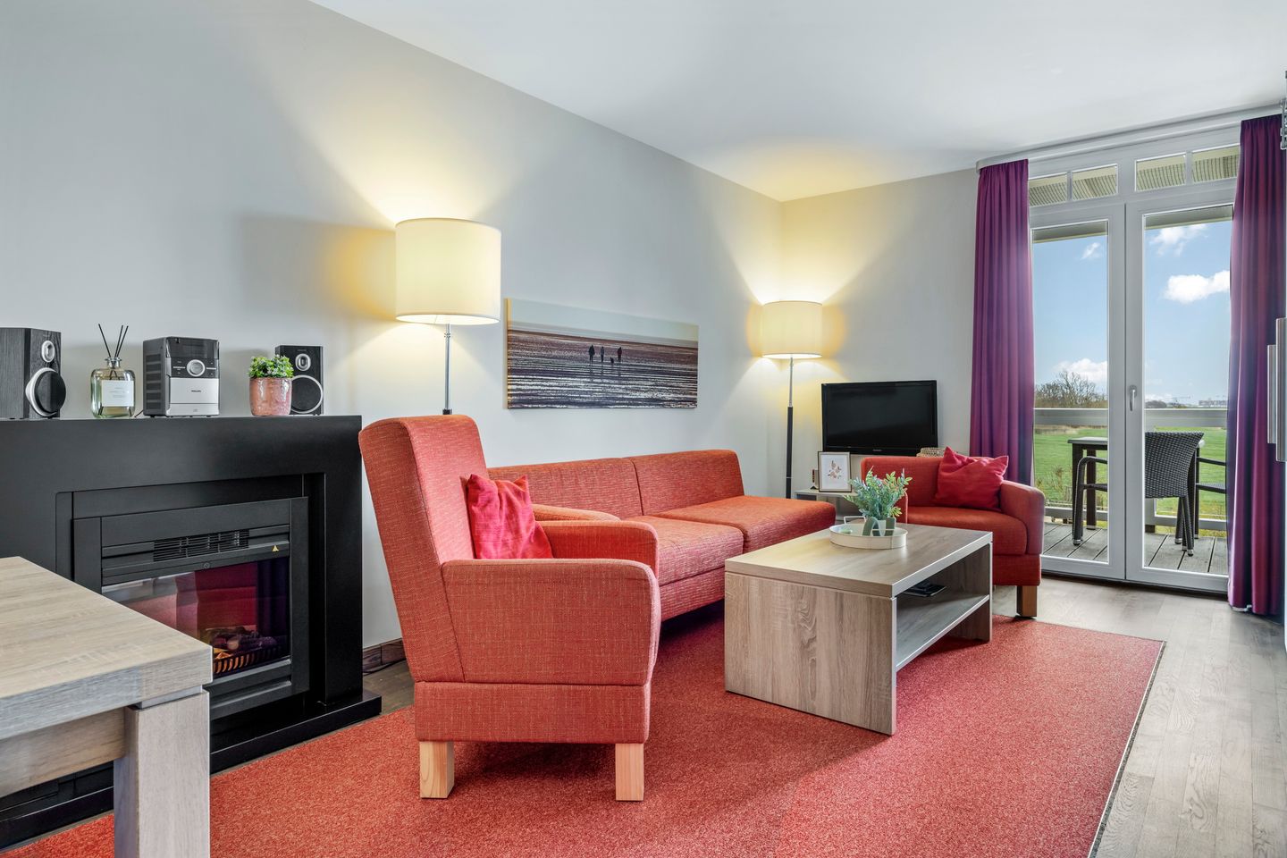 Resort Deichgraf Resort Deichgraf 27-13 Wremen - Wohnbereich mit Sofa, Sessel, Couchtisch