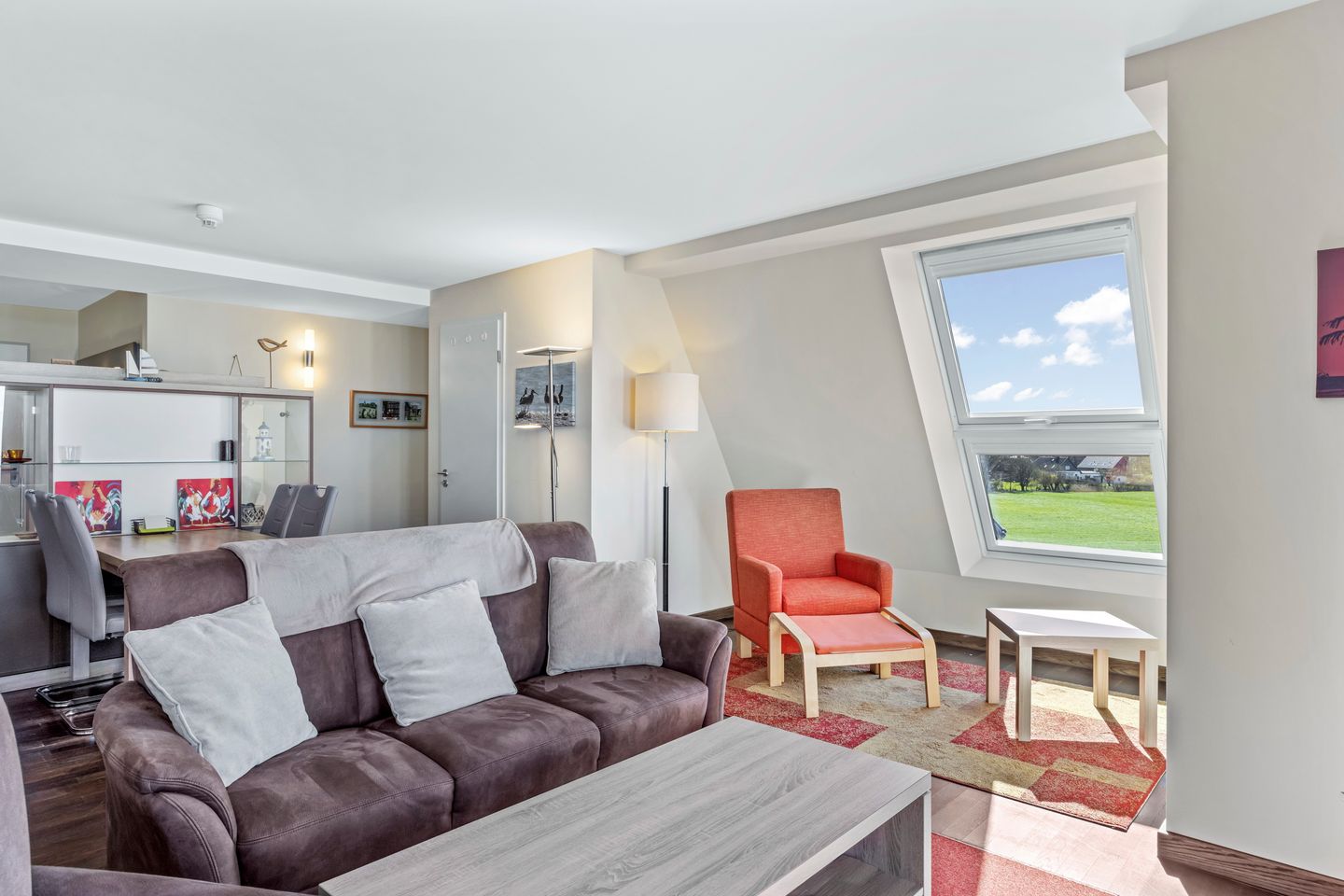 Resort Deichgraf Resort Deichgraf 27-19 Wremen - Wohnbereich mit Sofa, Sessel und Couchtisch