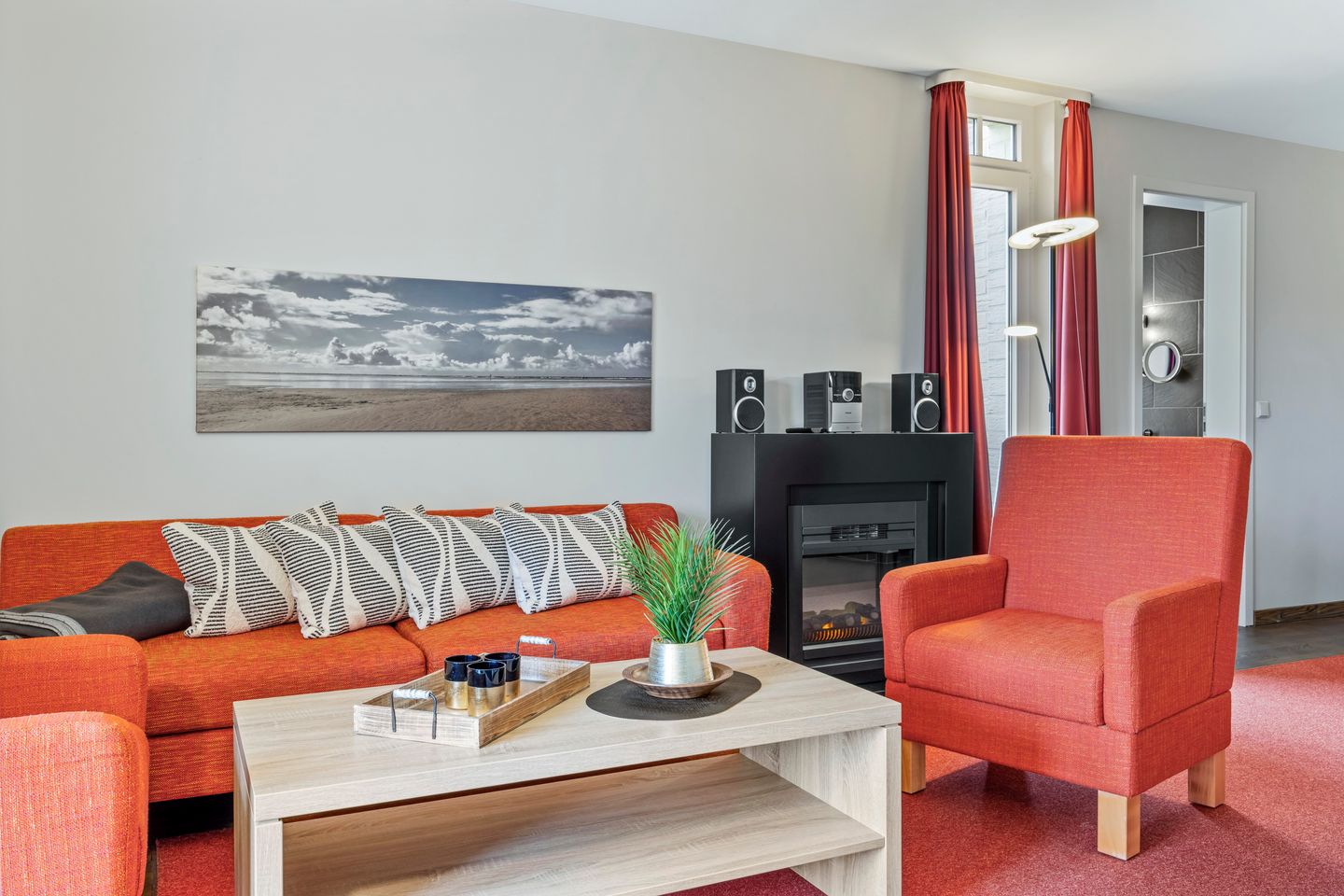 Resort Deichgraf Resort Deichgraf 31-02 Wremen - Wohnzimmer mit Kamin