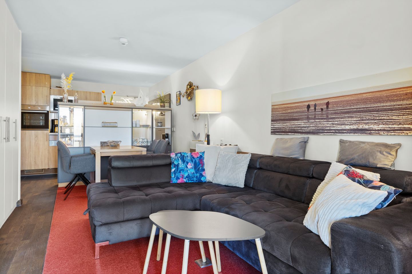 Resort Deichgraf Resort Deichgraf 31-07 Wremen - Wohnbereich mit Sofa, Sessel und Couchtisch