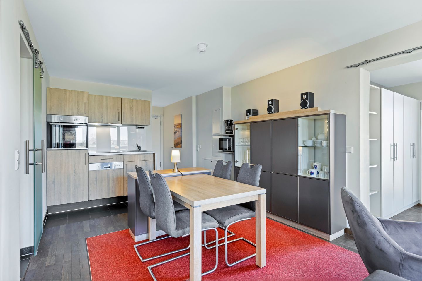 Resort Deichgraf Resort Deichgraf 31-08 Wremen - Wohn-Essbereich mit Esstisch und Sitzgelegenheit