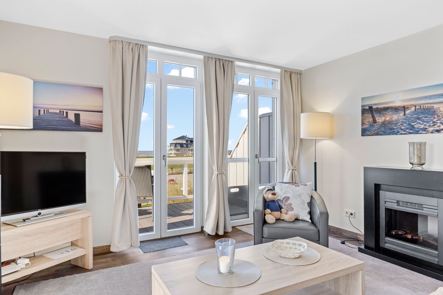 Resort Deichgraf Resort Deichgraf 31-21 Wremen - Wohnbereich mit Fernseher