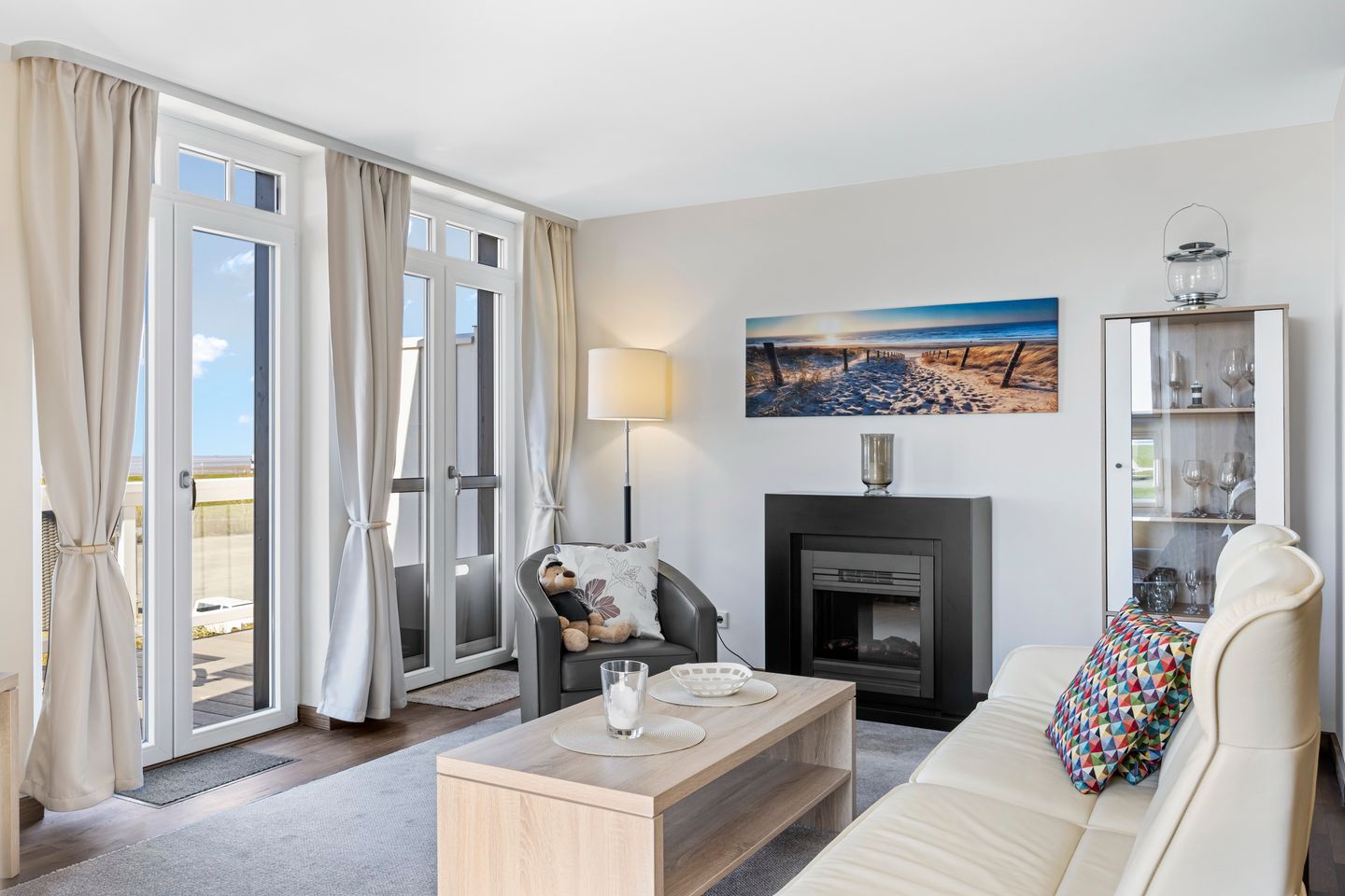 Resort Deichgraf Resort Deichgraf 31-21 Wremen - Wohnbereich mit Kaminofen