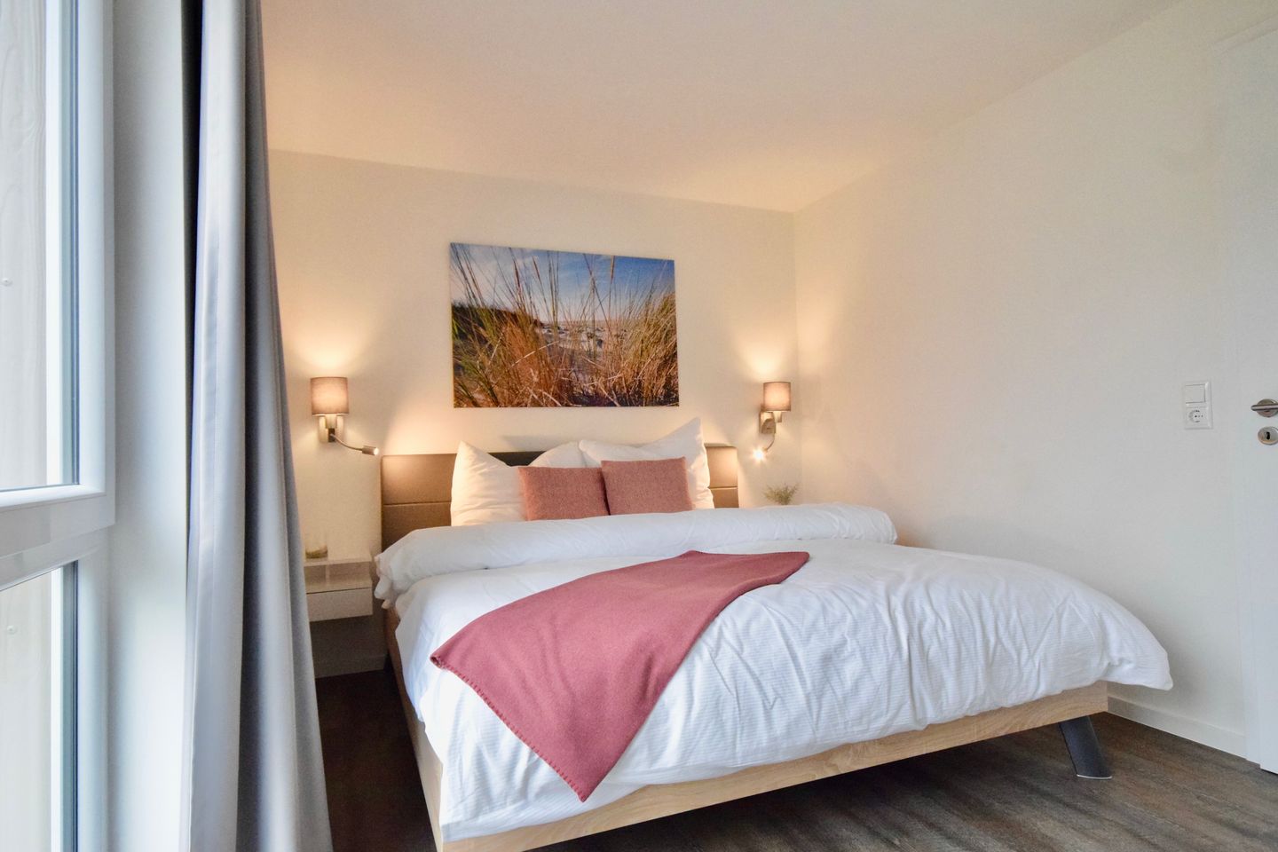 NordseeResort Friesland Ferienhäuser Nordseeresort Friesland 05 Schillig - Schlafzimmer mit Doppelbett