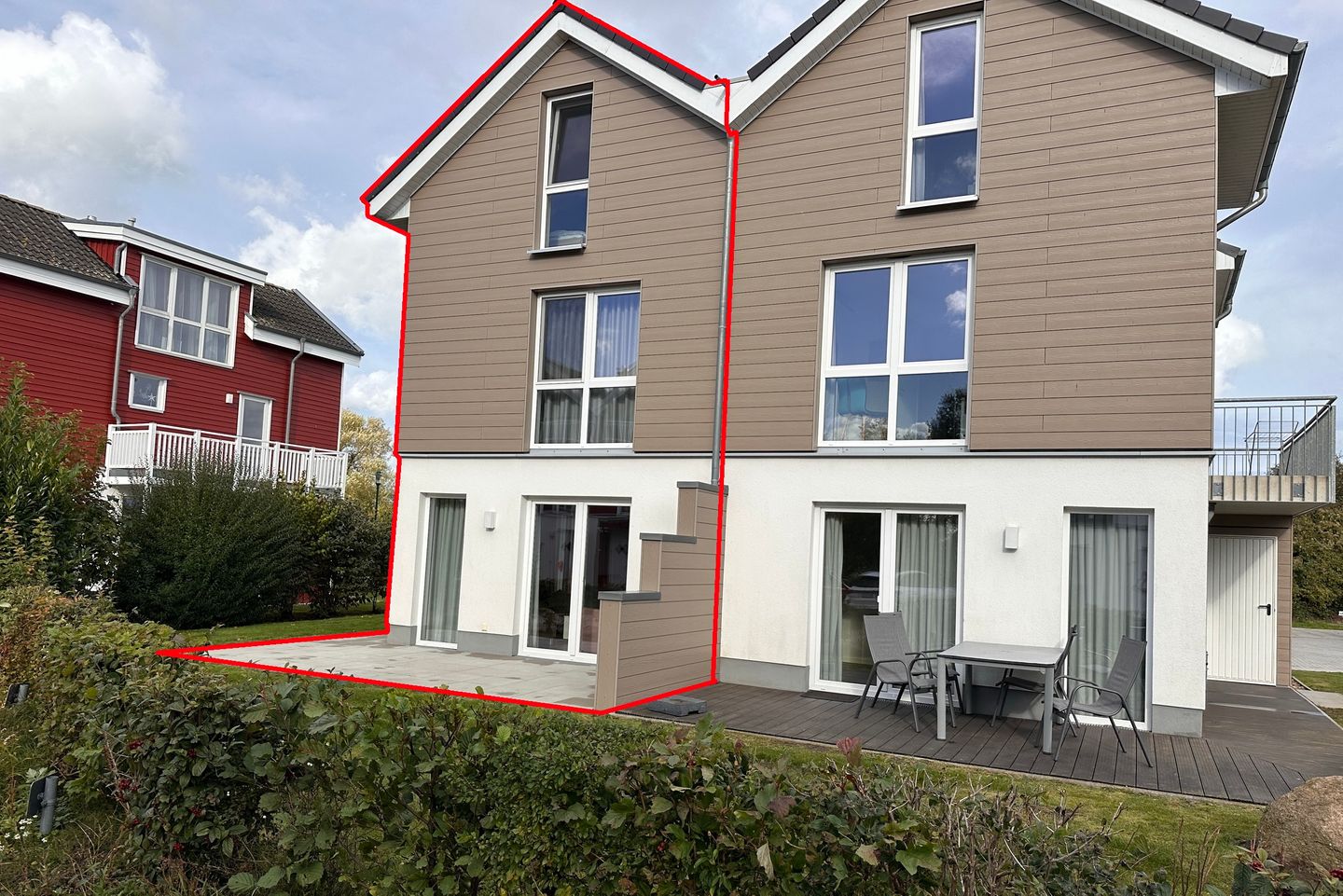 NordseeResort Friesland Ferienhäuser Nordseeresort Friesland 05 Schillig - Terrasse mit Gartenmöbeln