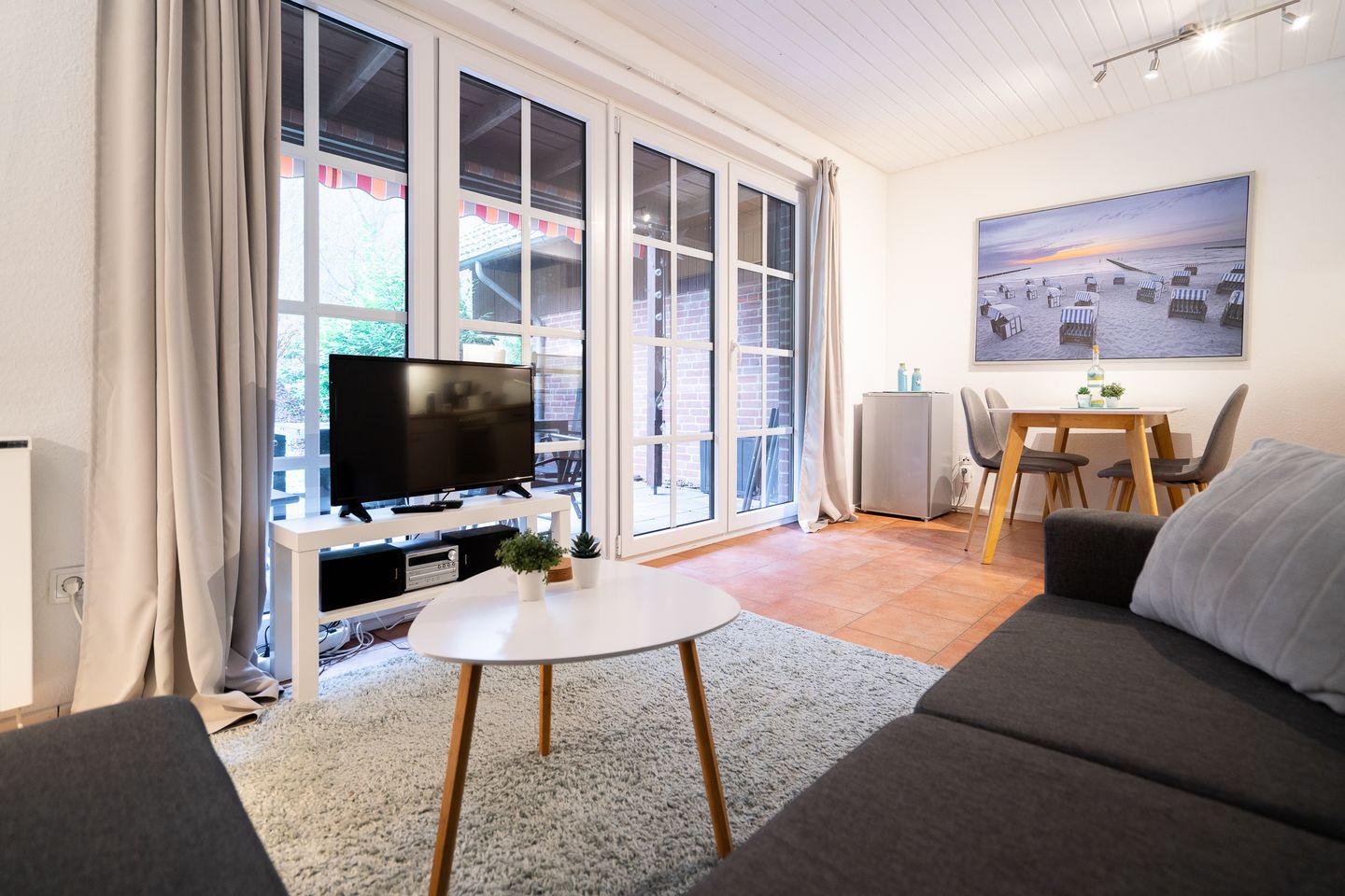  Ferienhaus Seeweg Wohnung 1 Scharbeutz - Wohnzimmer