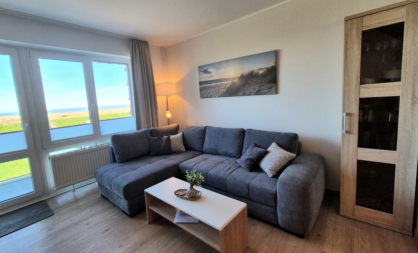 Hus Strandkieker Hus Strandkieker 03 Schillig - Wohn-Essbereich mit Couch