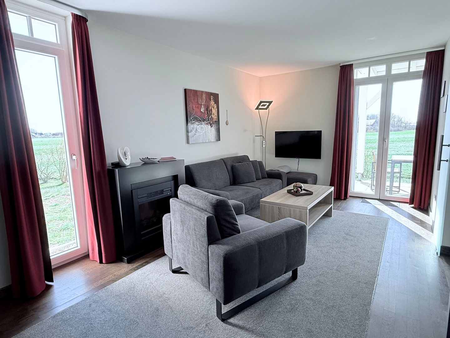 Resort Deichgraf Resort Deichgraf 31-04 Wremen - Wohn-Essbereich mit Couch