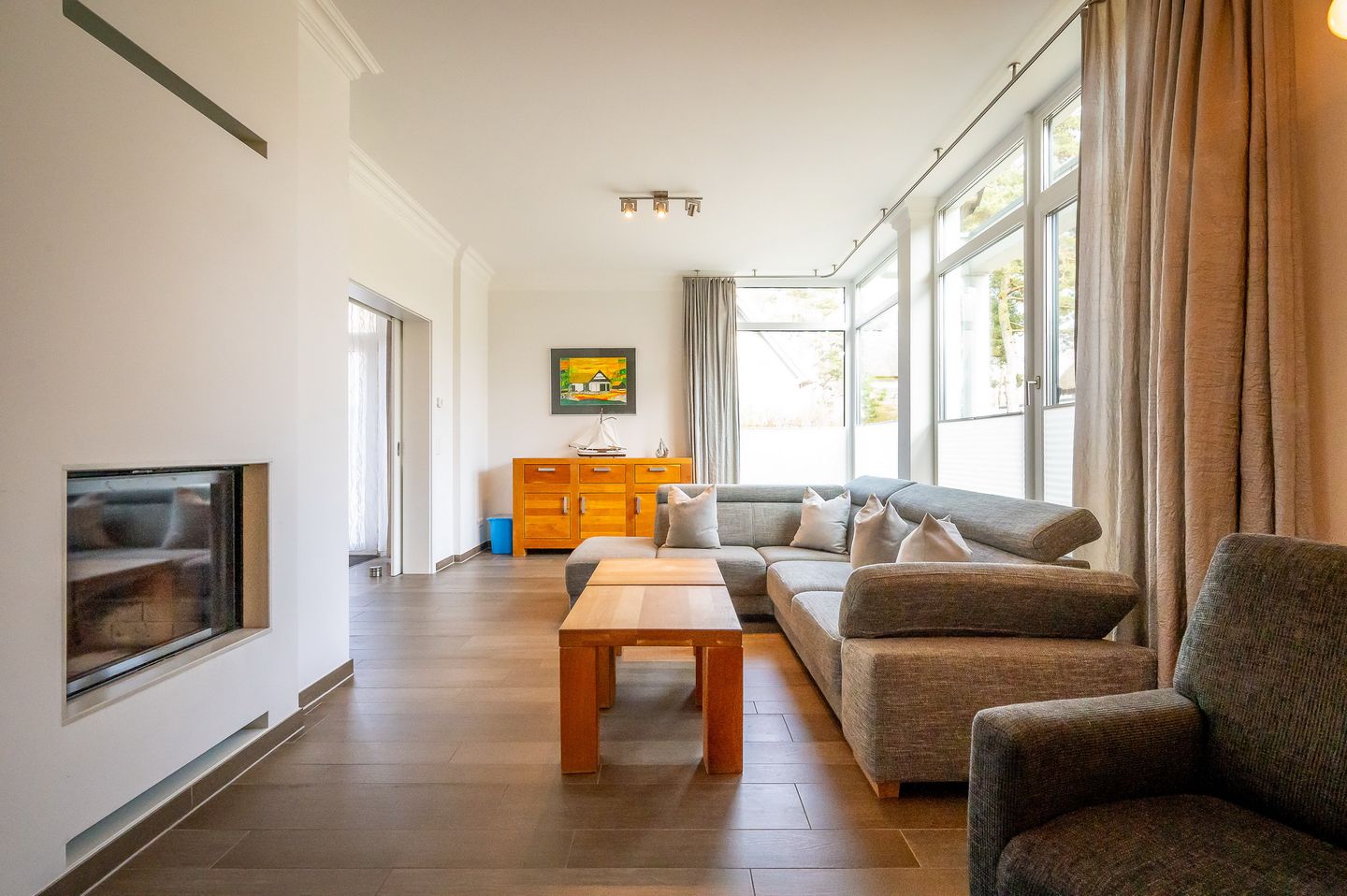 Ostseeland Ostseeland Lotsenstieg 11 Usedom - Wohnzimmer mit Kamim im Lotsenstieg 11 in Karlshagen auf Usedom