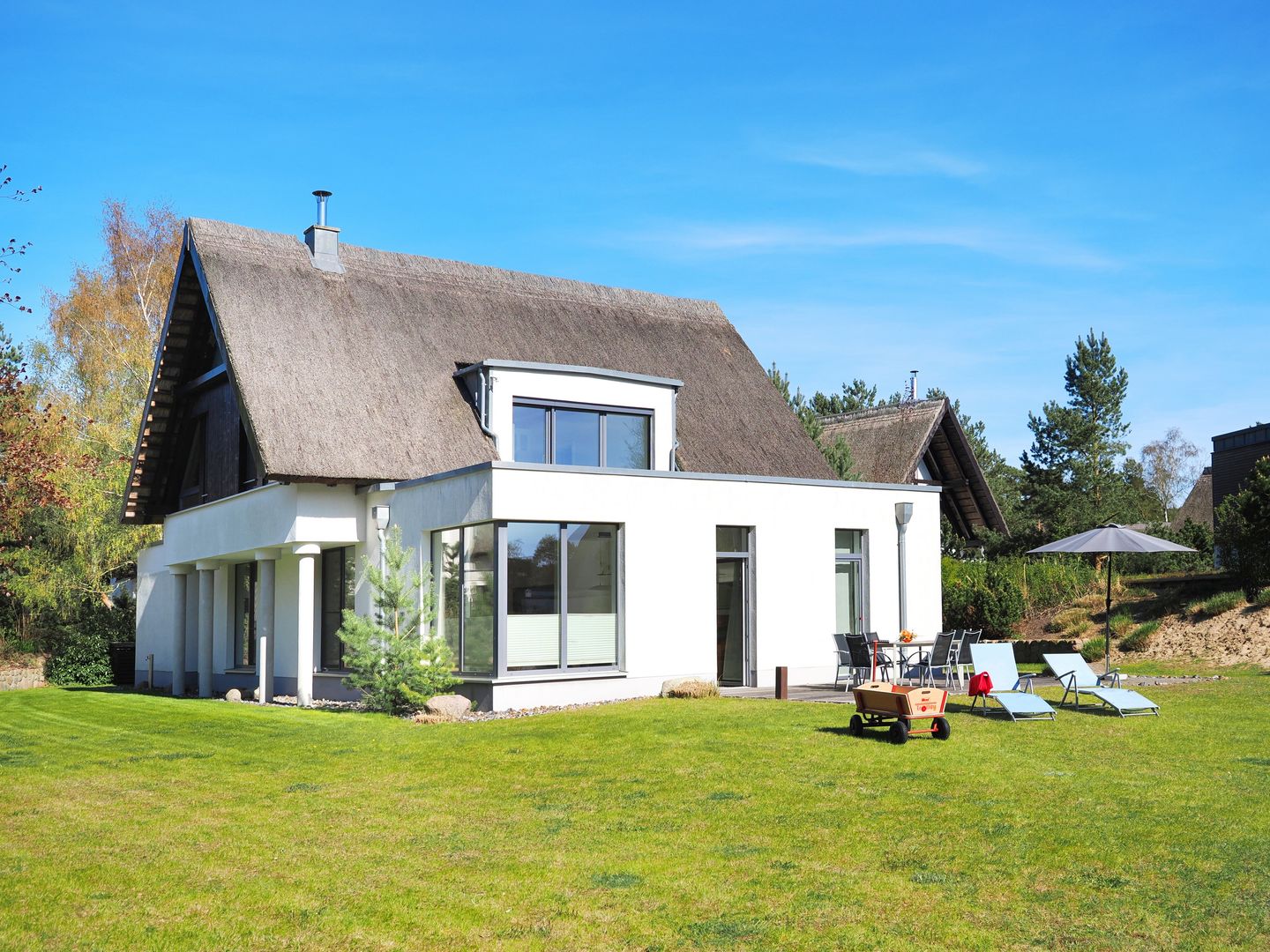 Ostseeland Ostseeland Kaitänsweg 17 Usedom - Terrasse mit Garten vom Kapitänsweg 17, usolka17, Karlshagen auf Usedom