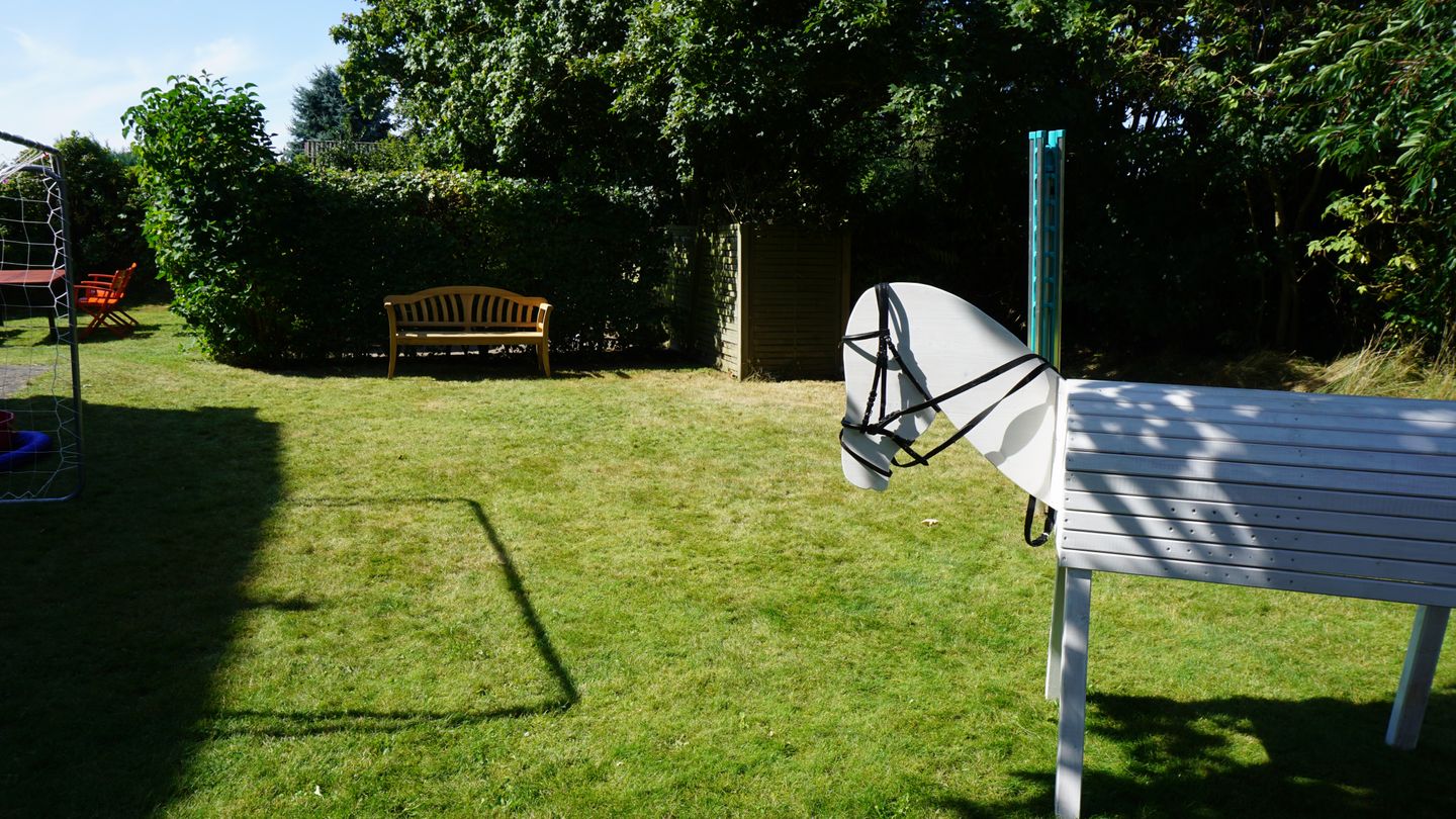  Ferienhaus Ellen, OG Whg.  - Garten