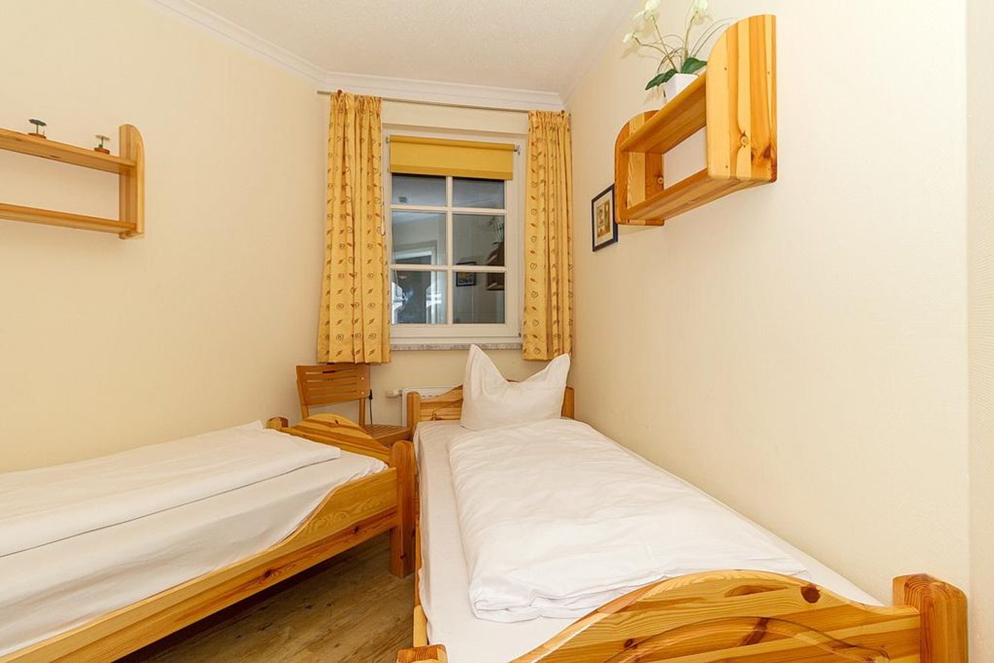 Apartmenthaus Atlantik Apartmenthaus Atlantik 214 Kühlungsborn - Schlafzimmer mit zwei Einzelbetten