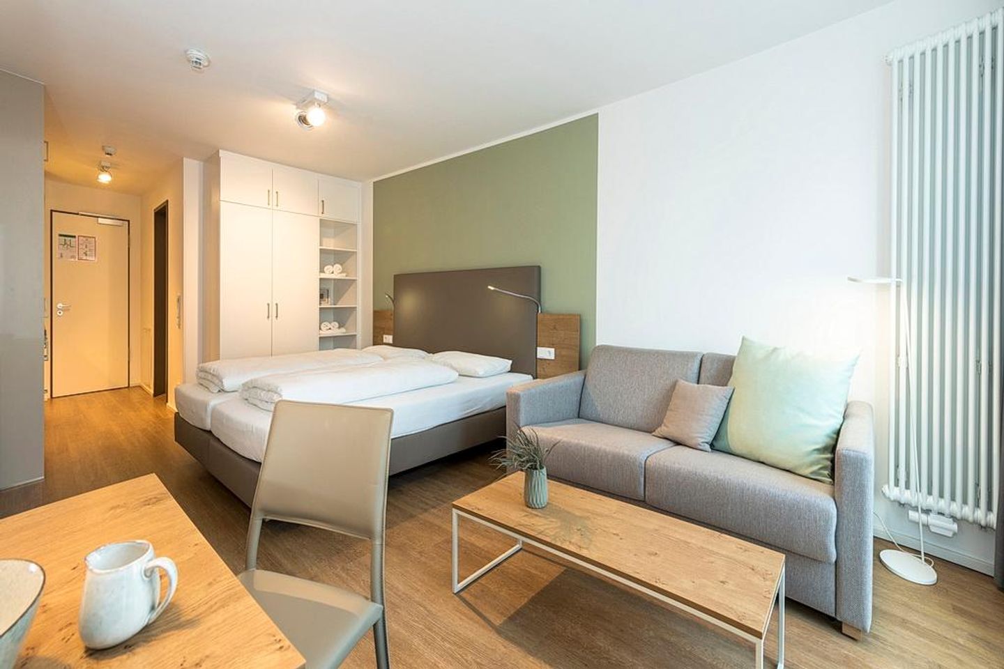 Apartmentvilla Anna See Apartmentvilla Anna See 1-02 Langeoog - Wohn-Schlafbereich mit Couch