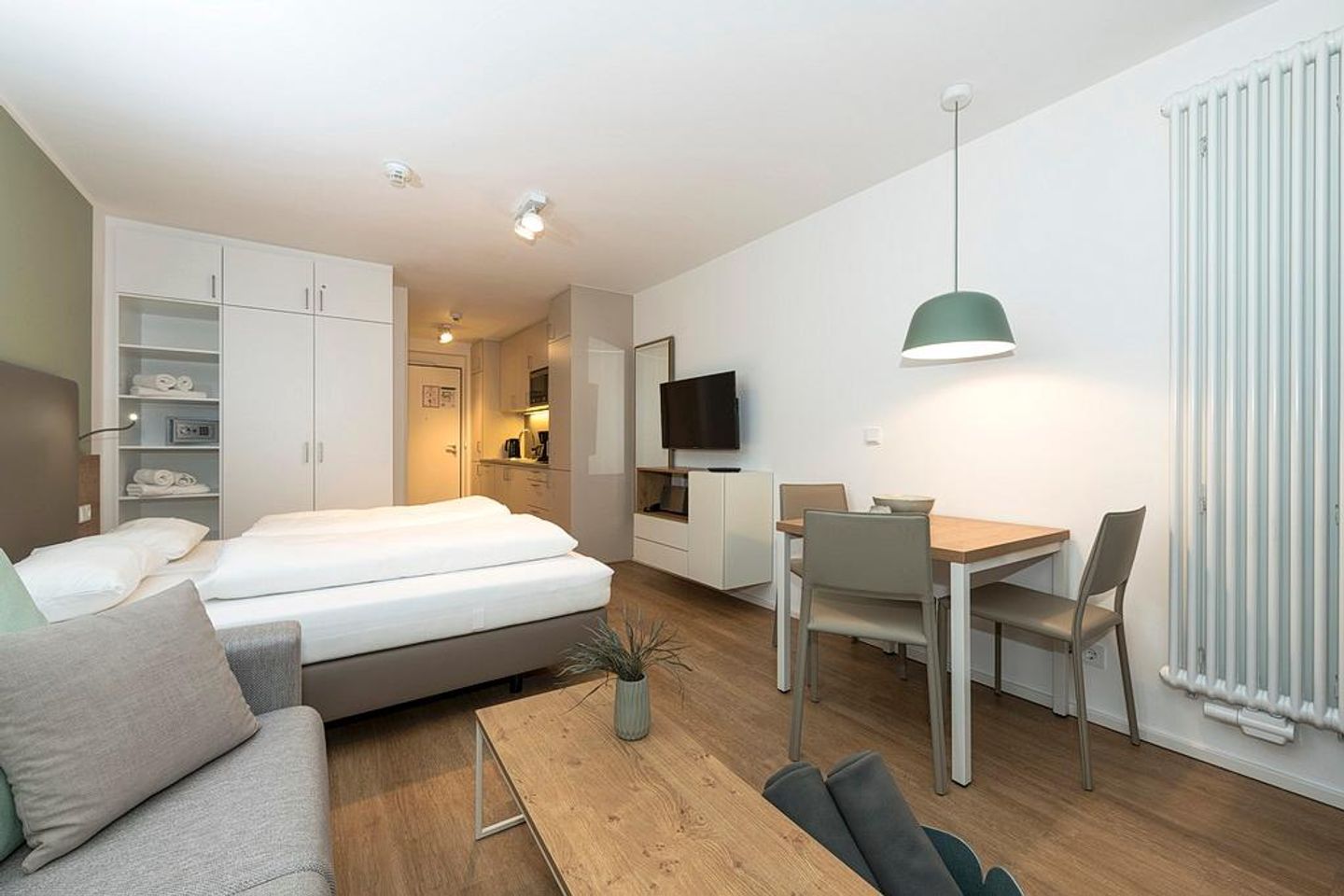 Apartmentvilla Anna See Apartmentvilla Anna See 1-06 Langeoog - Wohn-Schlafbereich mit Sitzgelegenheit