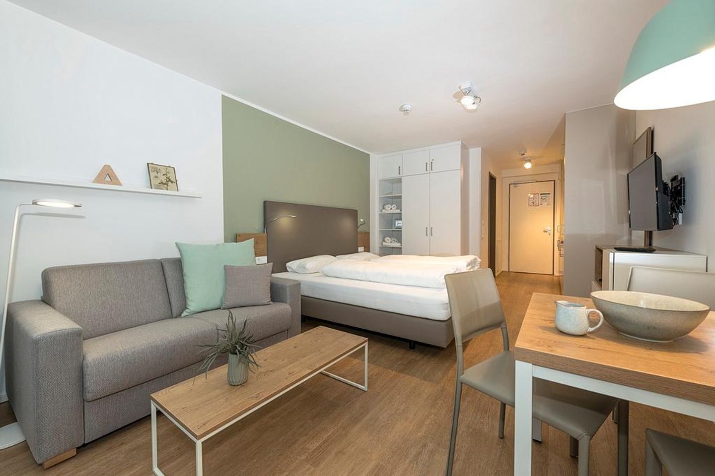 Apartmentvilla Anna See Apartmentvilla Anna See 1-06 Langeoog - Wohn-Schlafbereich mit Couch