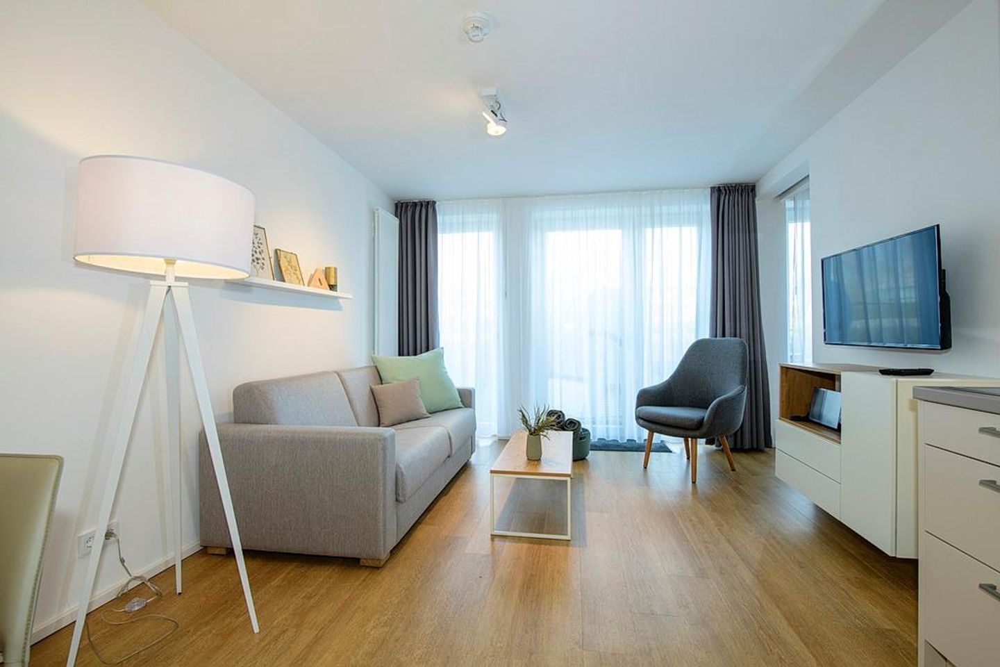 Apartmentvilla Anna See Apartmentvilla Anna See 1-14 Langeoog - Wohn-Essbereich mit Couch und Sessel