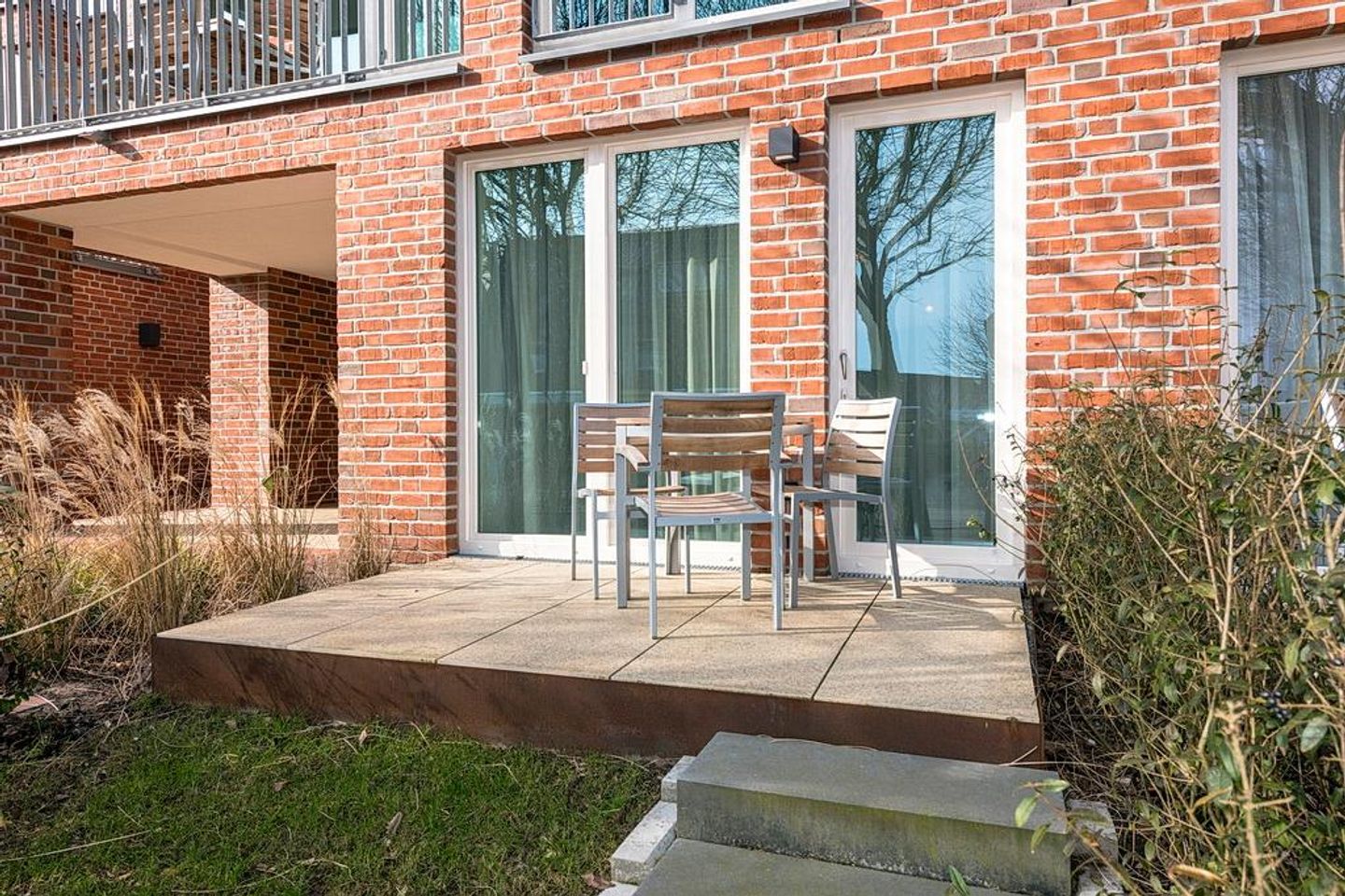 Apartmentvilla Anna See Apartmentvilla Anna See 1-18 Langeoog - Terrasse mit Tisch und Sitzgelegenheiten