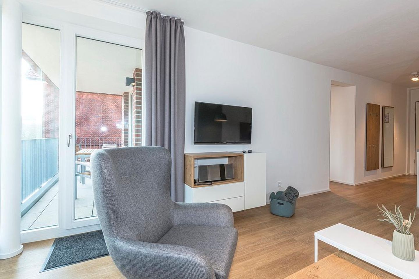 Apartmentvilla Anna See Apartmentvilla Anna See 2-02 Langeoog - Wohn-Essbereich mit Zugang zum Balkon