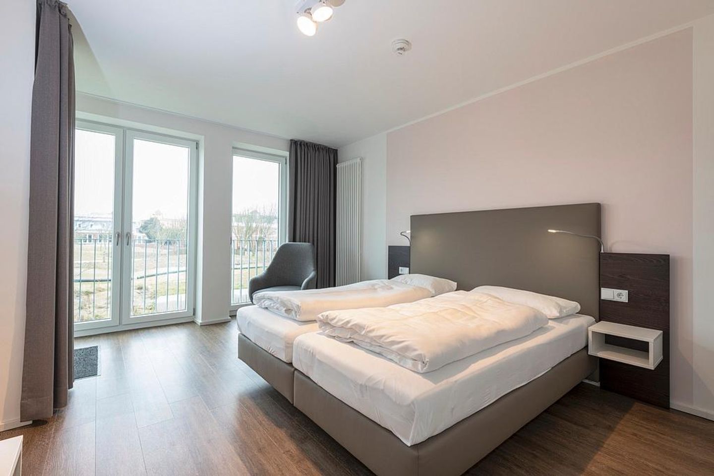 Apartmentvilla Anna See Apartmentvilla Anna See 2-10 Langeoog - Schlafzimmer mit Doppelbett